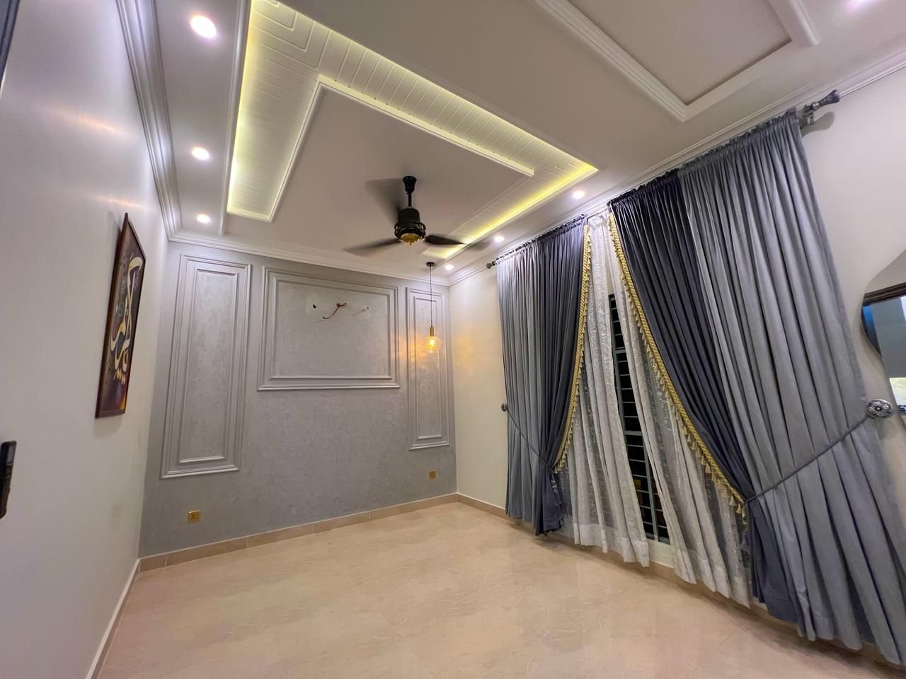 Bedroom with striped curtains